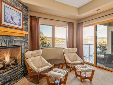 bedroom with fireplace and views of Columbia River